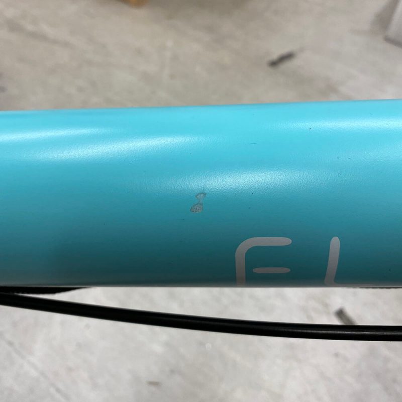 Small paint chip on centre of top tube