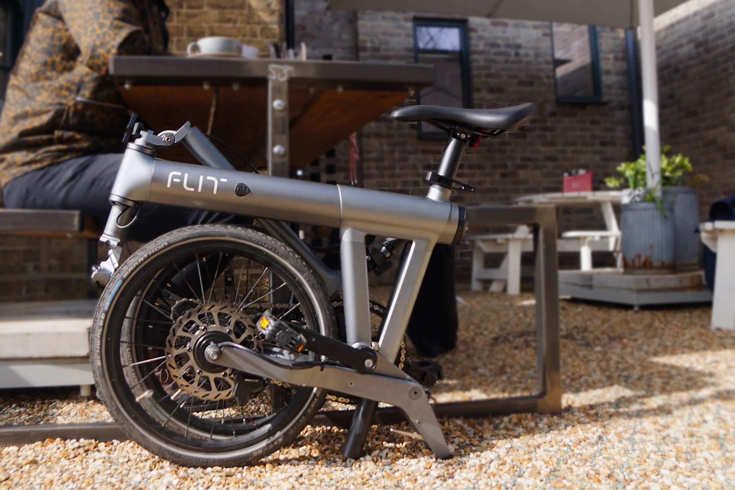 The M2 folded up at a sunny cafe stop
